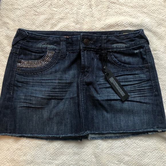 Express Dresses & Skirts - Express distressed blue denim mini skirt with rhinestone-embellished Pockets